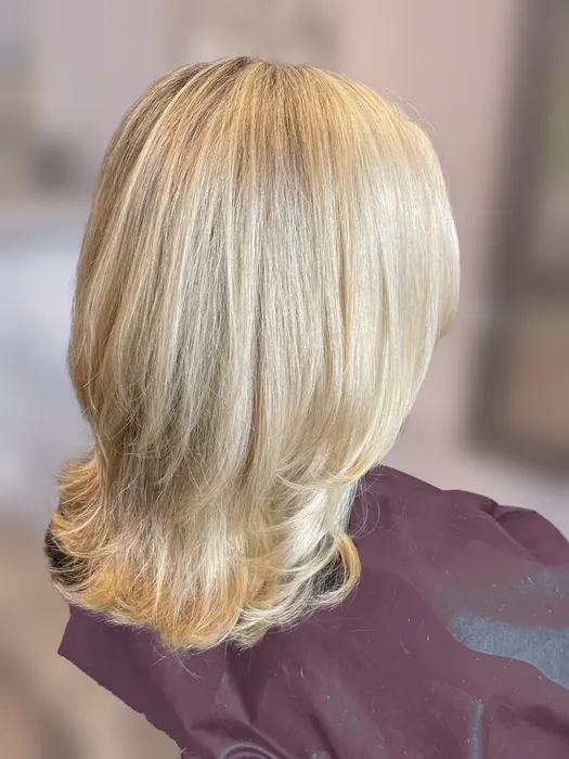 Bright blonde shoulder-length layers
